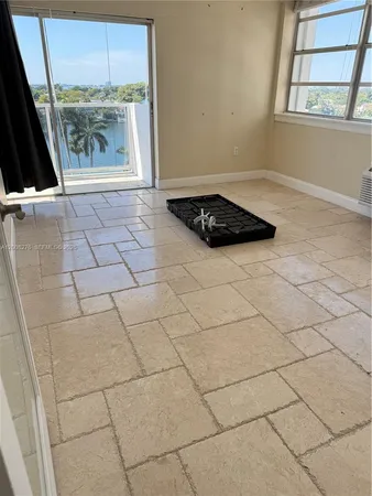 a bathroom with a sink a vanity and a shower