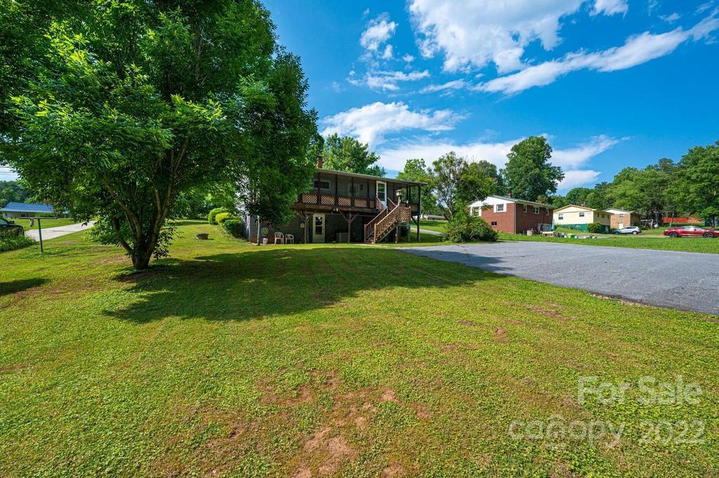 4254 Hartland Road Lenoir, NC 28645 - Photo 11 of 47 a view of a park with swings and slides