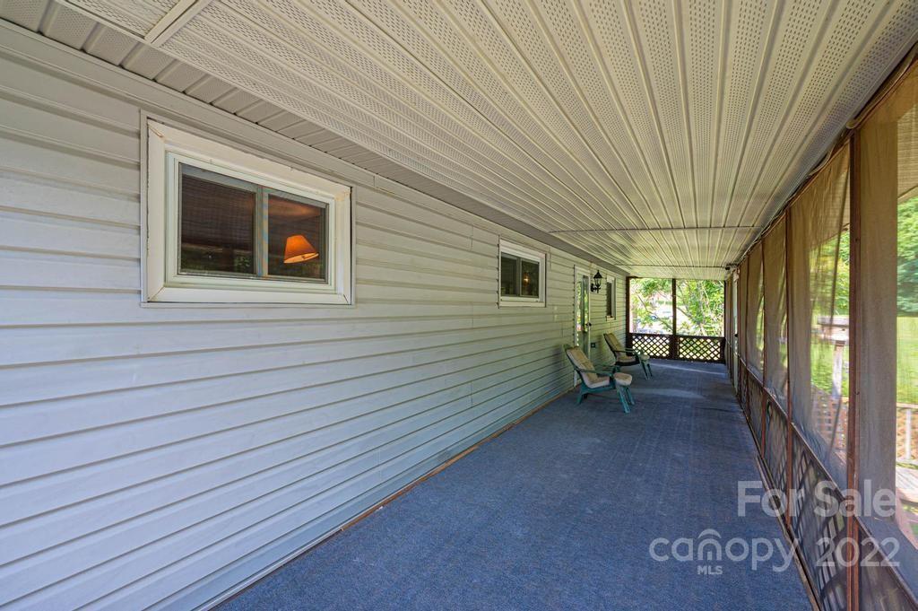 4254 Hartland Road Lenoir, NC 28645 - Photo 14 of 47 a view of a house with a porch