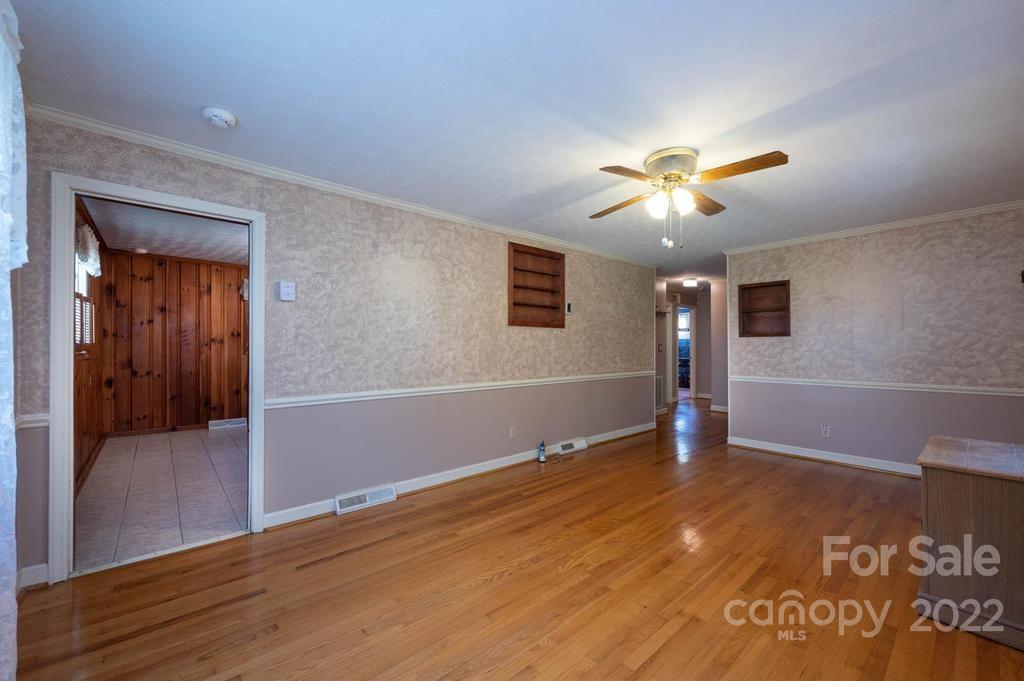 4254 Hartland Road Lenoir, NC 28645 - Photo 19 of 47 a view of empty room with wooden floor