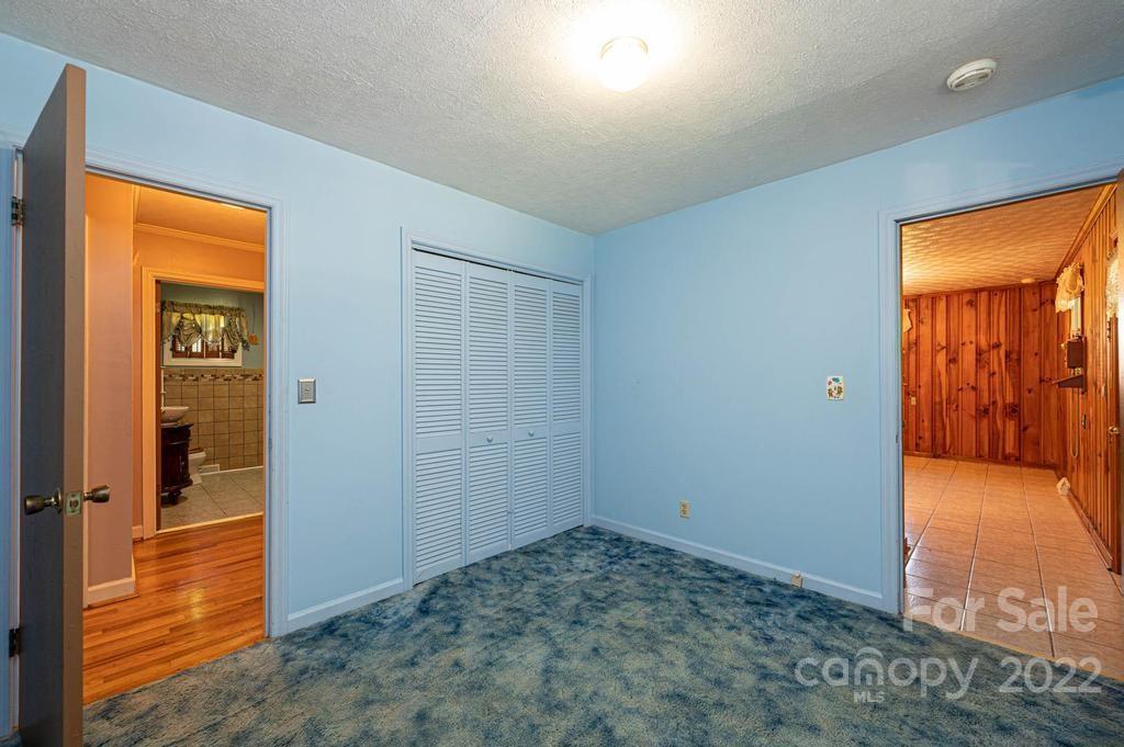 4254 Hartland Road Lenoir, NC 28645 - Photo 28 of 47 wooden floor in an empty room