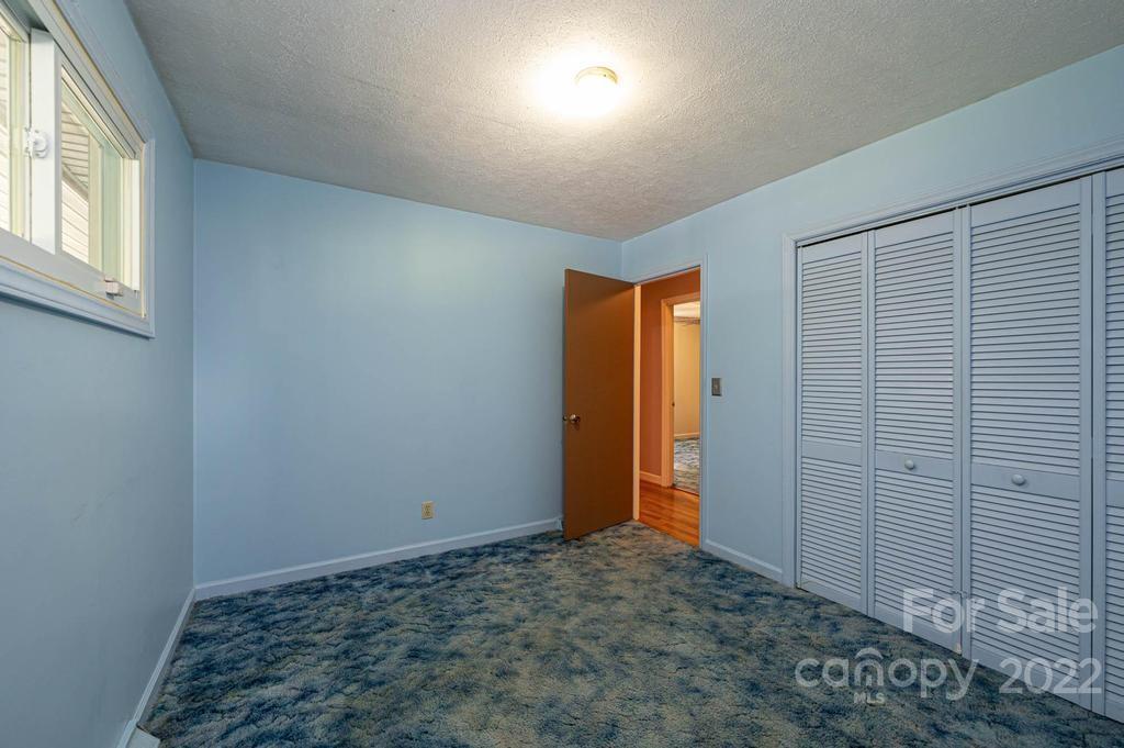 4254 Hartland Road Lenoir, NC 28645 - Photo 29 of 47 an empty room with an entryway