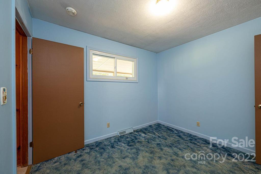 4254 Hartland Road Lenoir, NC 28645 - Photo 30 of 47 an empty room with a window