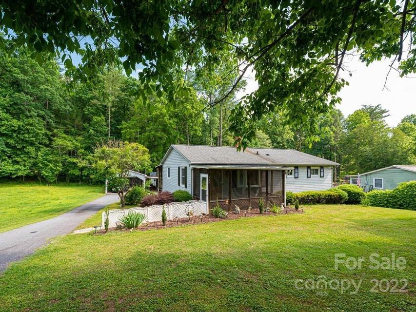 4254 Hartland Road Lenoir, NC 28645 - Photo 3 of 47 a front view of a house with garden