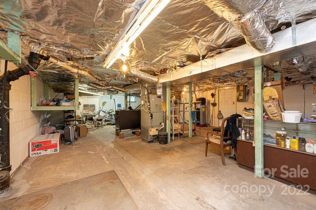 4254 Hartland Road Lenoir, NC 28645 - Photo 40 of 47 a view of a room with gym equipment