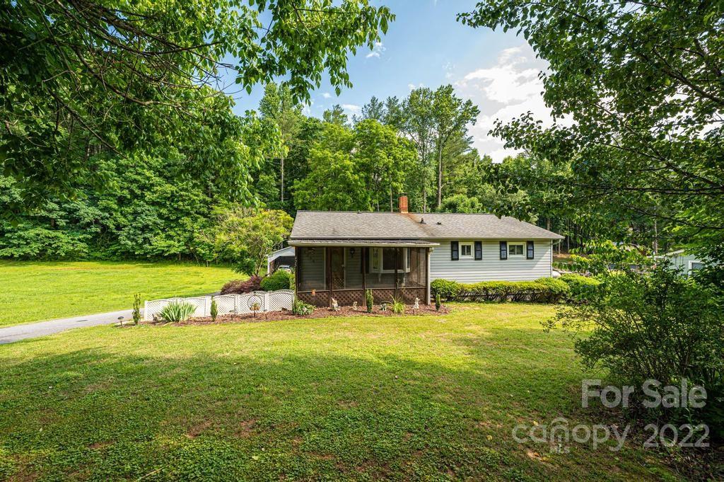4254 Hartland Road Lenoir, NC 28645 - Photo 47 of 47 a view of a house with a garden
