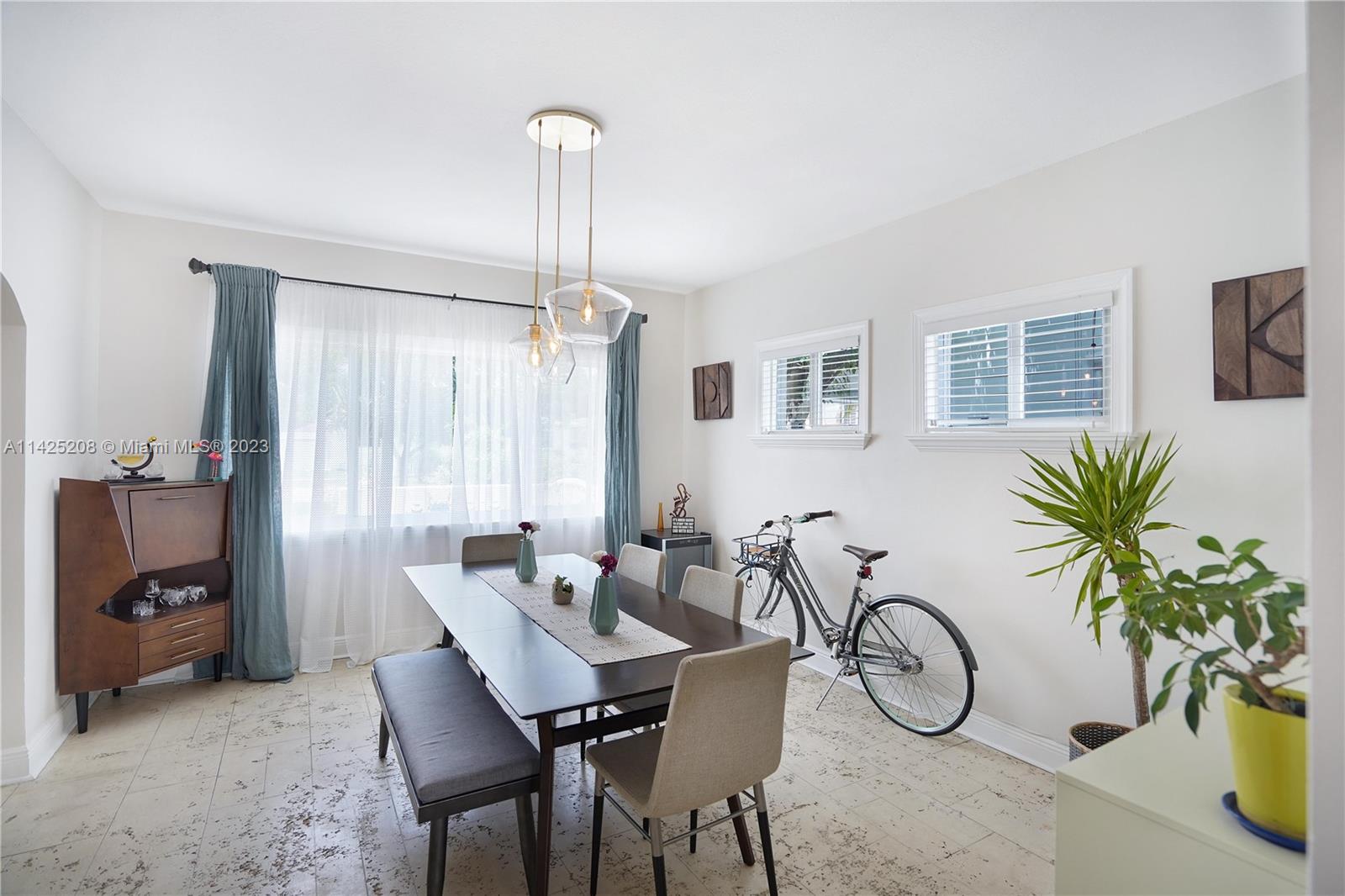 2235 Southwest 11th Terrace Miami, FL 33135 - Photo 18 of 43 a view of a livingroom with furniture window and entryway