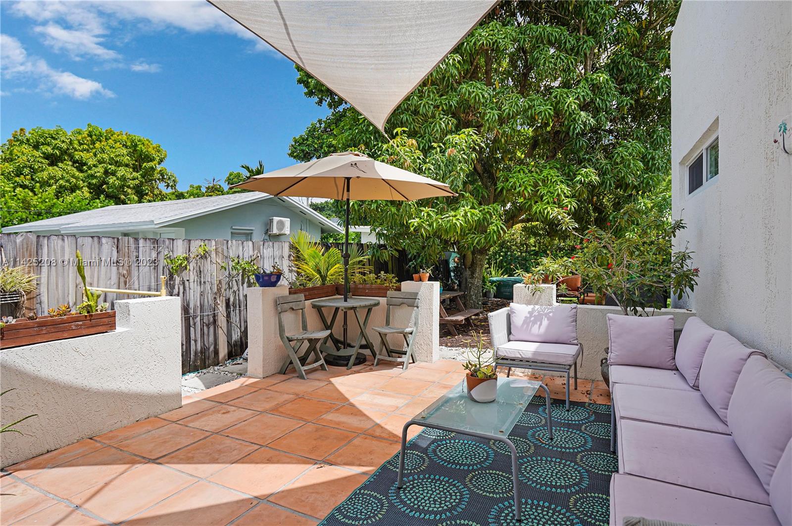 2235 Southwest 11th Terrace Miami, FL 33135 - Photo 38 of 43 a view of a patio with furniture and a fire pit