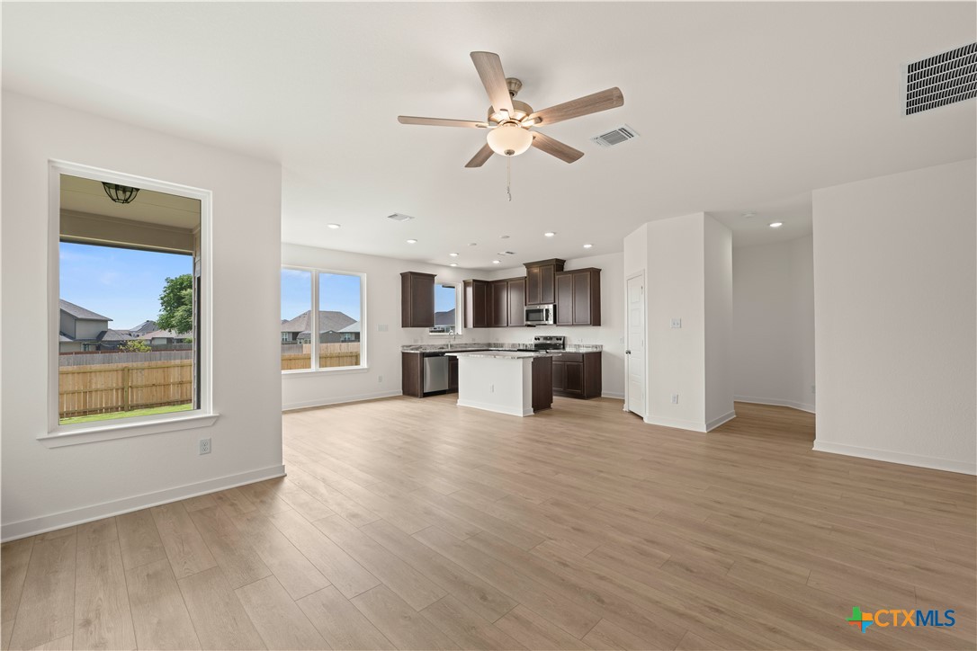 7715 Krenek Tap Drive Temple, TX 76502 - Photo 23 of 30 a view of a kitchen with wooden floor and a kitchen