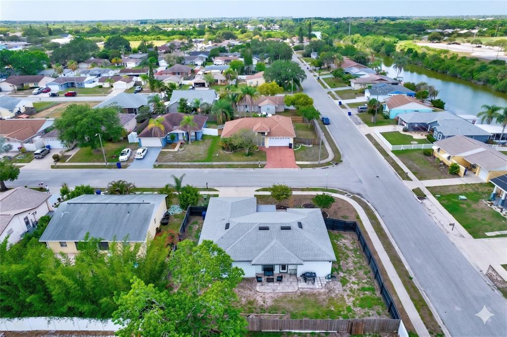 3023 Muir Street Holiday, FL 34691 - Photo 24 of 25 an aerial view of a house with a garden