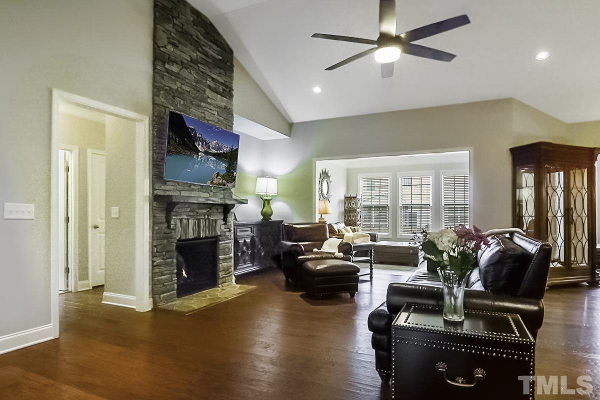 7617 Channery Way Raleigh, NC 27616 - Photo 11 of 42 a living room with furniture or fireplace and a wooden floor