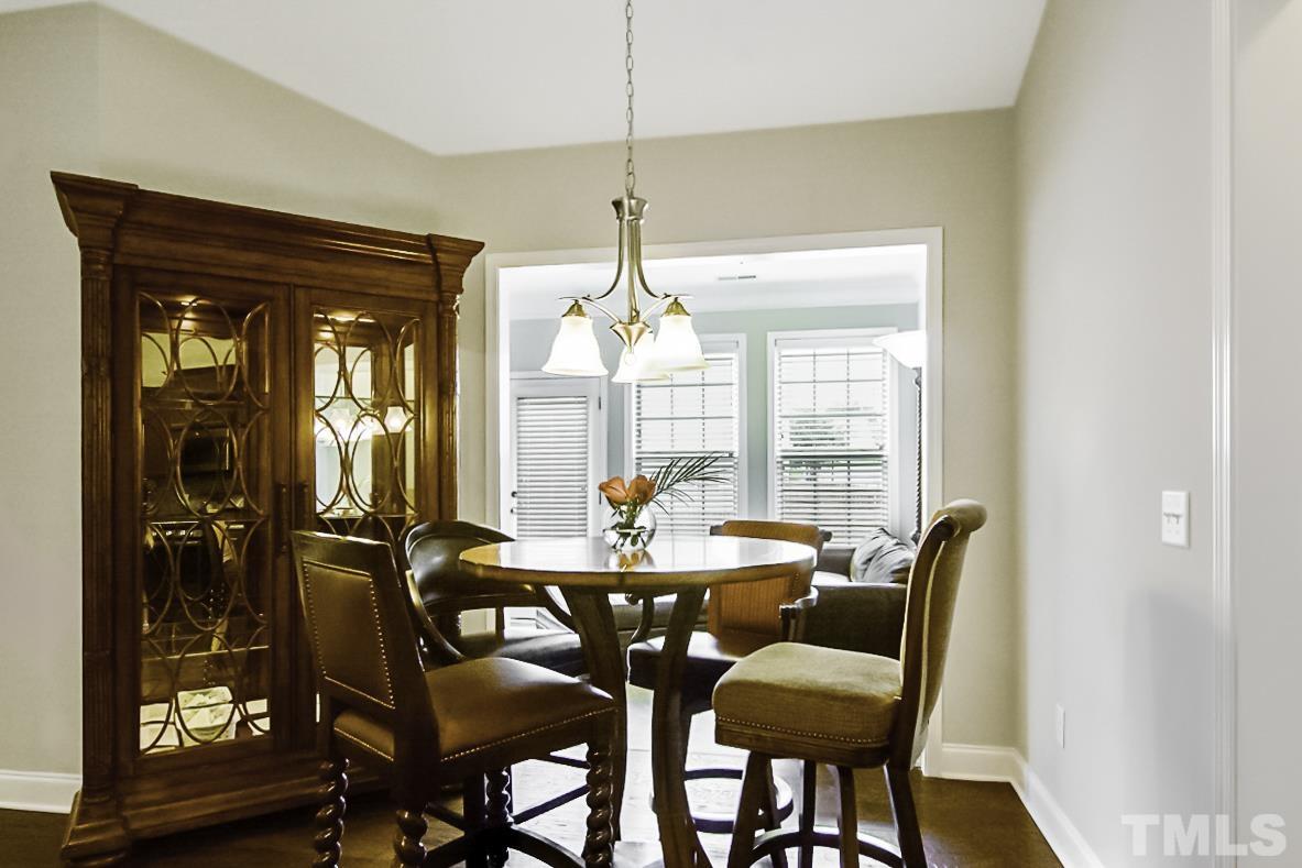 7617 Channery Way Raleigh, NC 27616 - Photo 16 of 42 a dining room with furniture and window