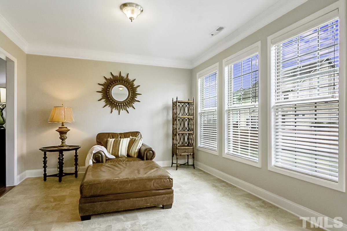 7617 Channery Way Raleigh, NC 27616 - Photo 17 of 42 a bedroom with furniture and a large window