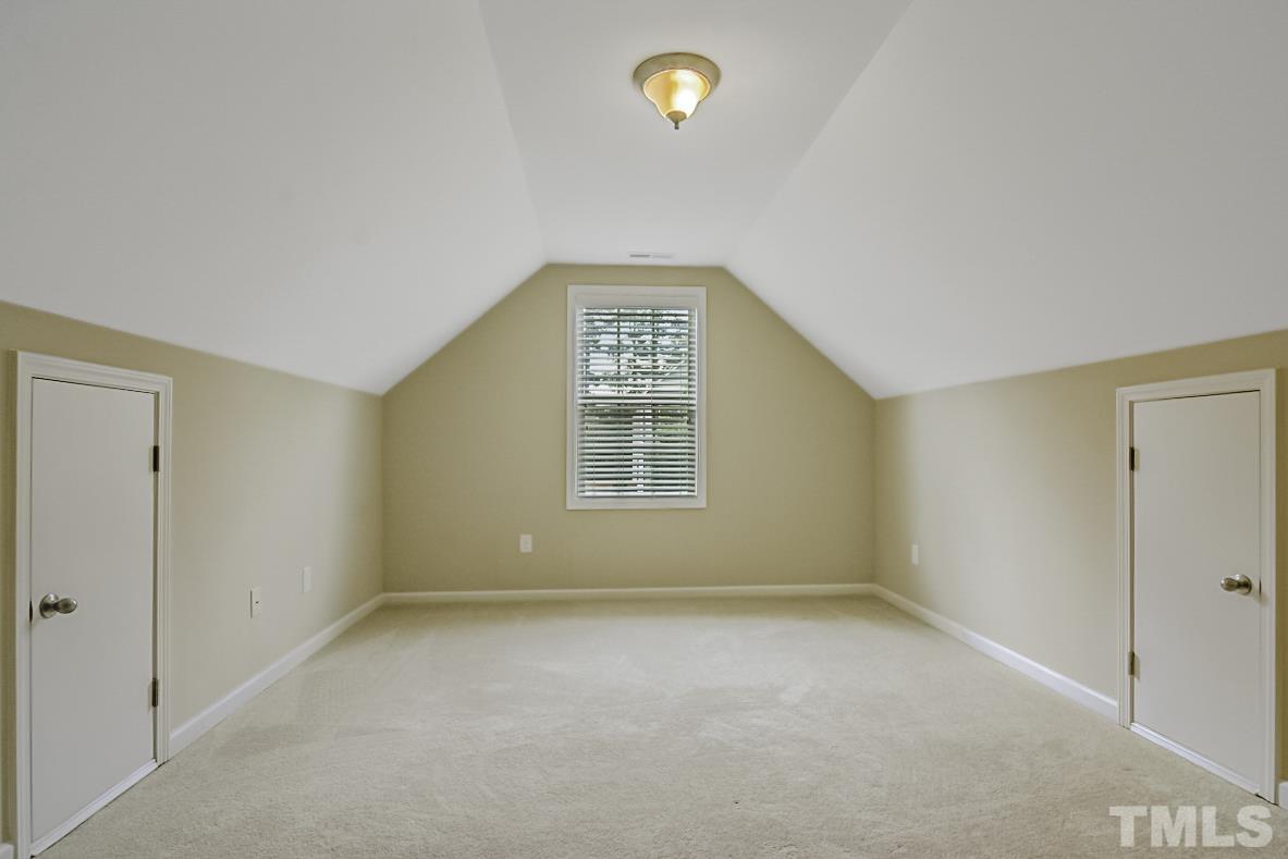 7617 Channery Way Raleigh, NC 27616 - Photo 30 of 42 a view of an empty room with a window