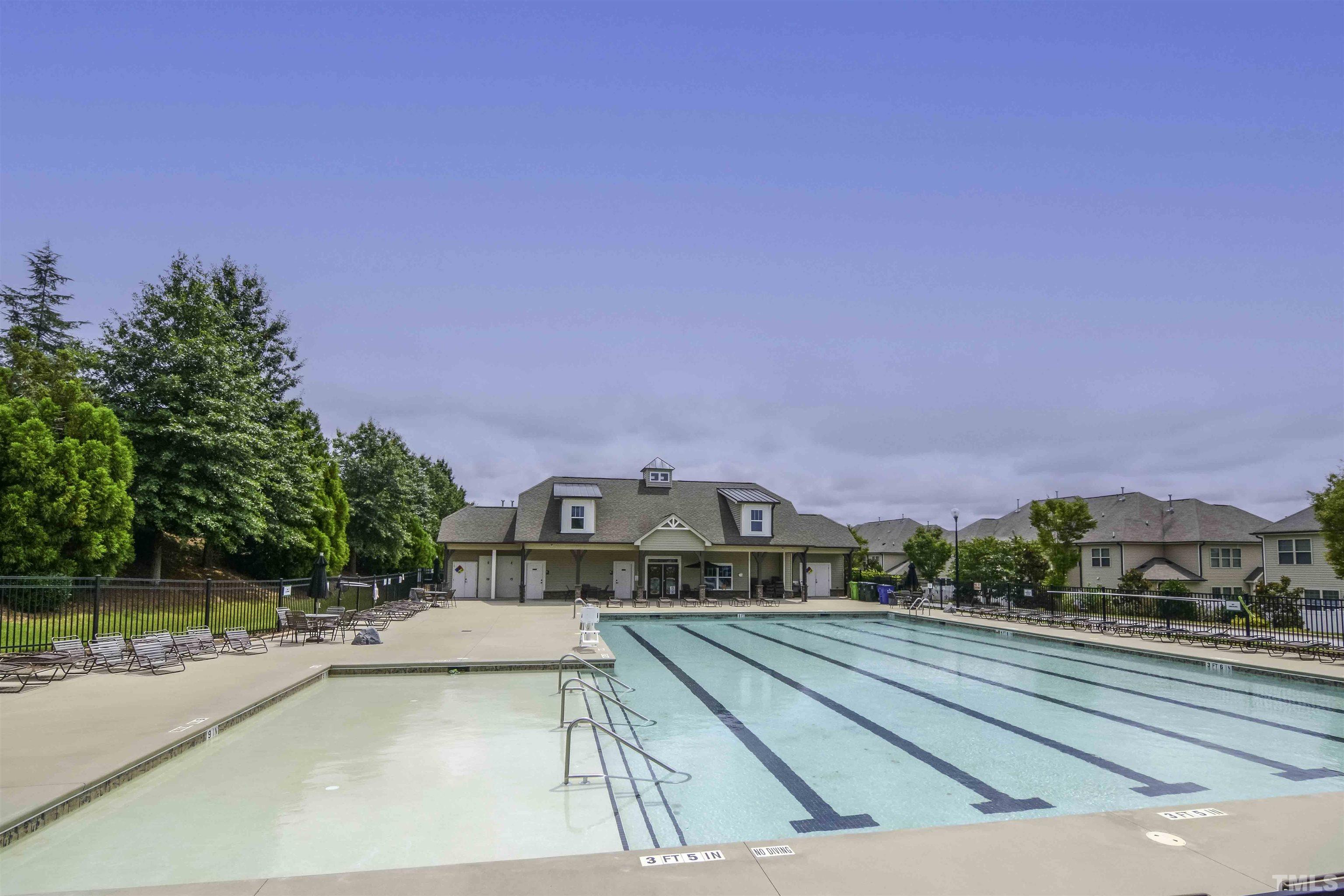 7617 Channery Way Raleigh, NC 27616 - Photo 41 of 42 a view of houses with swimming pool