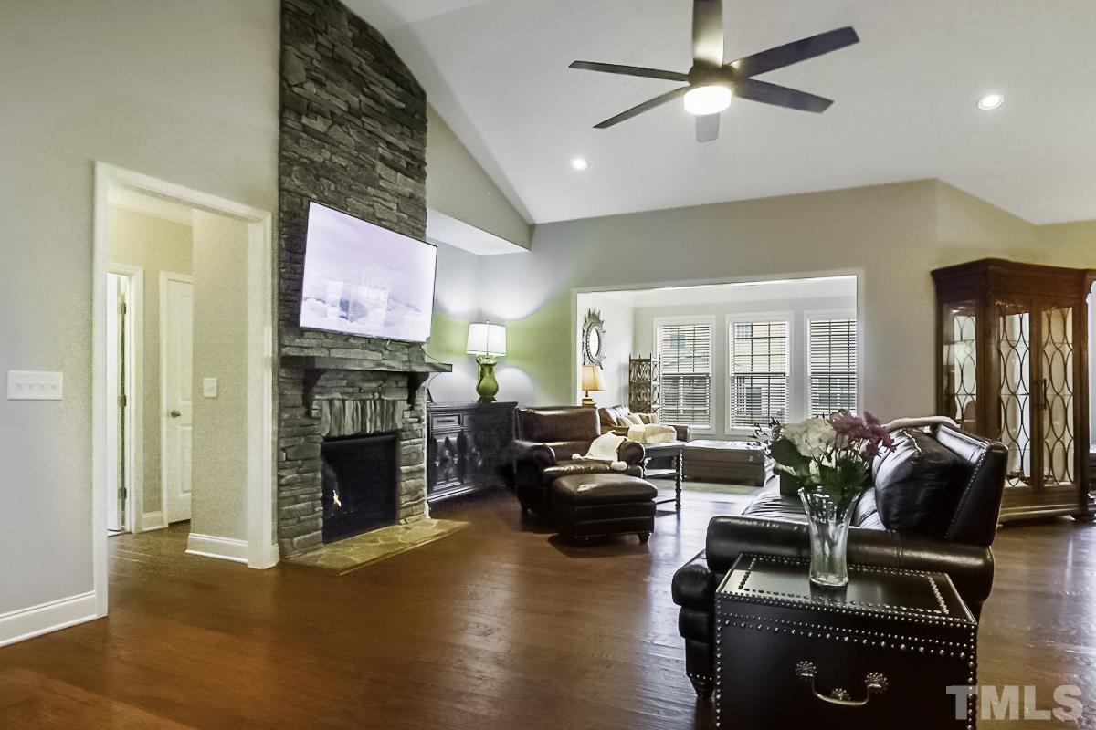 7617 Channery Way Raleigh, NC 27616 - Photo 10 of 42 a living room with furniture or fireplace and a wooden floor
