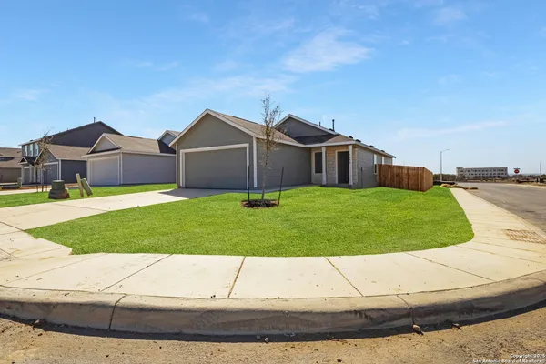 a house view with a garden space