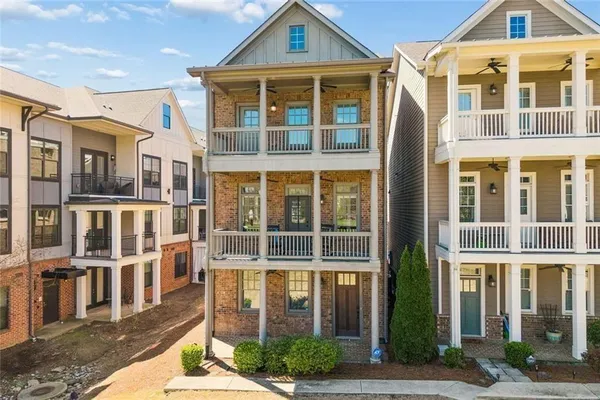 an aerial view of a house with outdoor space and street view