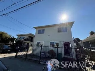a view of a chairs and table in the patio