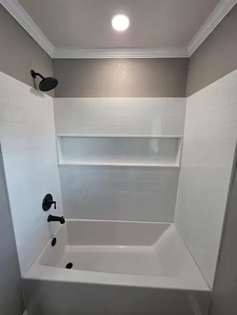 a bathroom with a bathtub