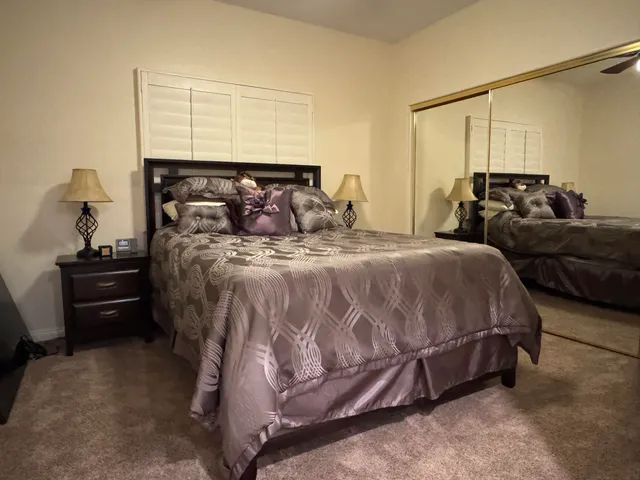a view of a patio with swimming pool