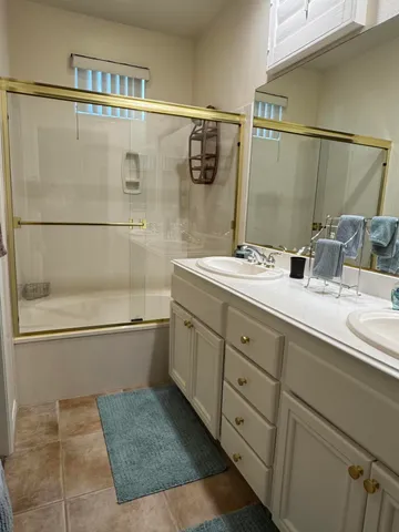 a view of a swimming pool with a yard