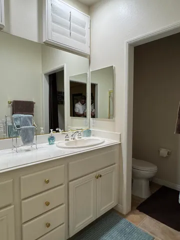 a view of a swimming pool and lounge chair