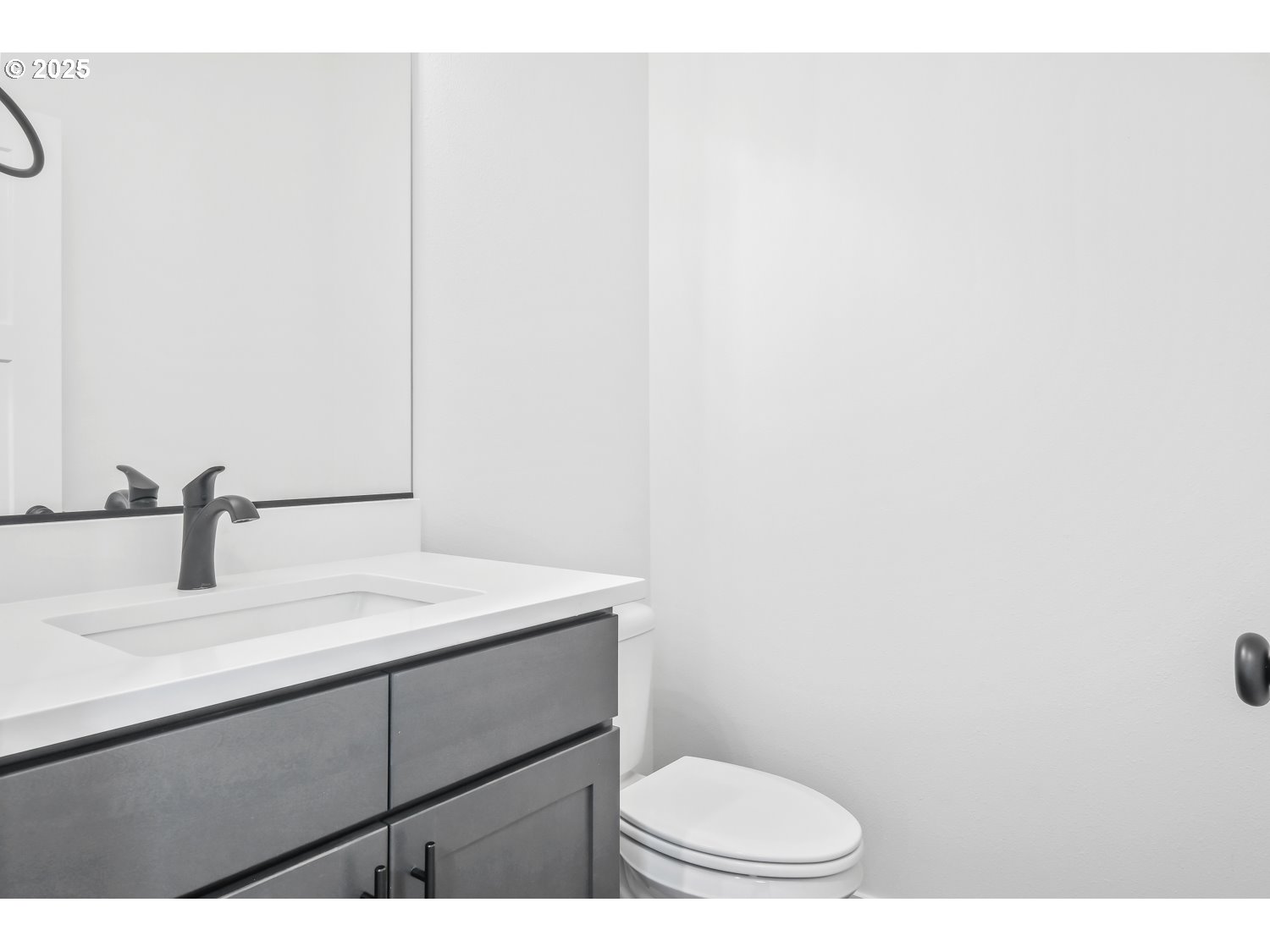 41900 Deschutes Avenue, Unit 81B Sandy, OR 97055 - Photo 12 of 33 a bathroom with a sink a toilet and mirror