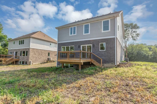 a roof view with sitting space and garden