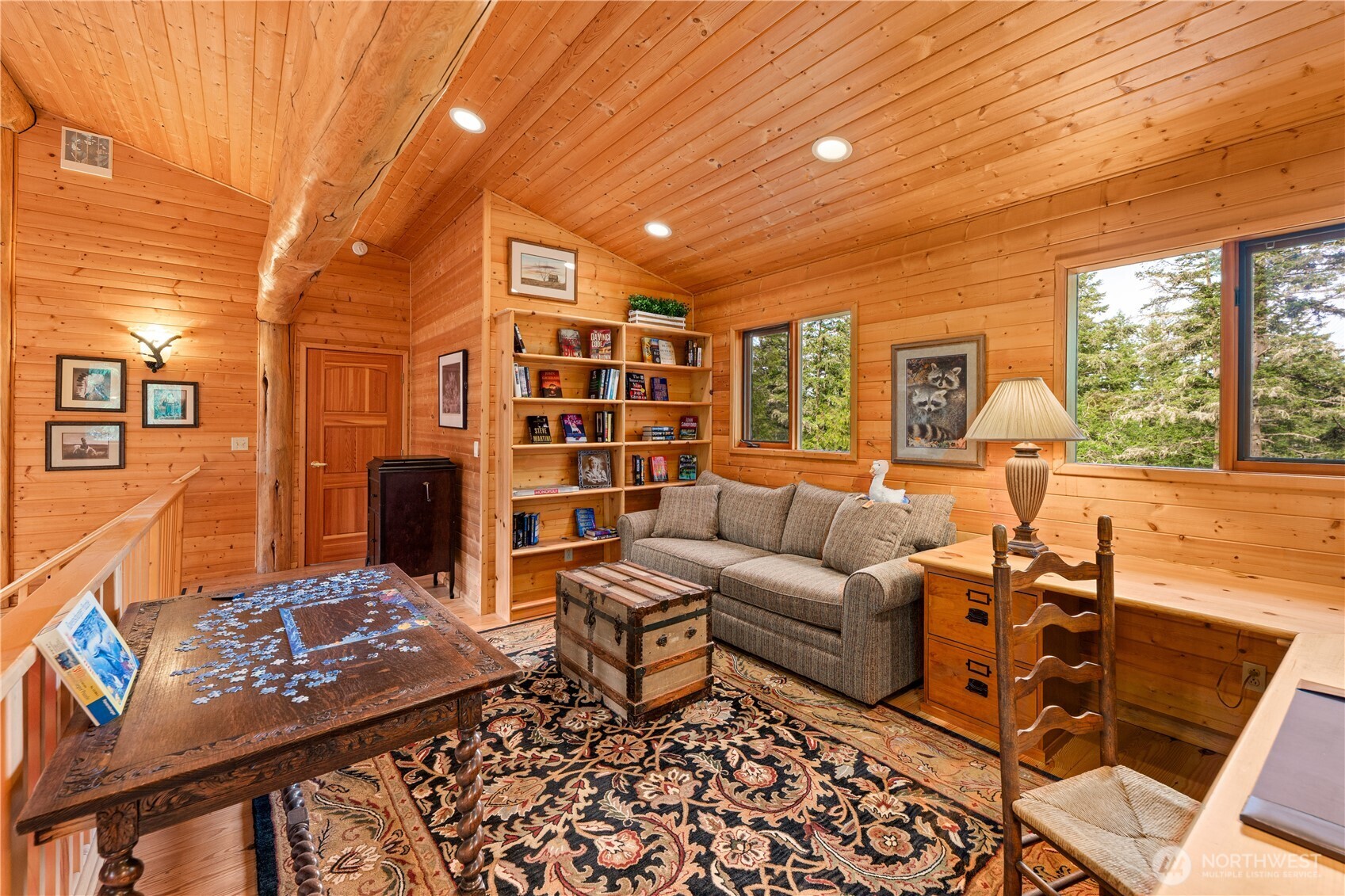 134 Sacred Moon Way Friday Harbor, WA 98250 - Photo 22 of 35 a living room with furniture a rug and a chandelier
