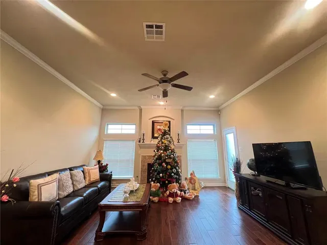 a room with lots of furniture and a window