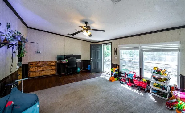 a kitchen with a refrigerator and a cabinets