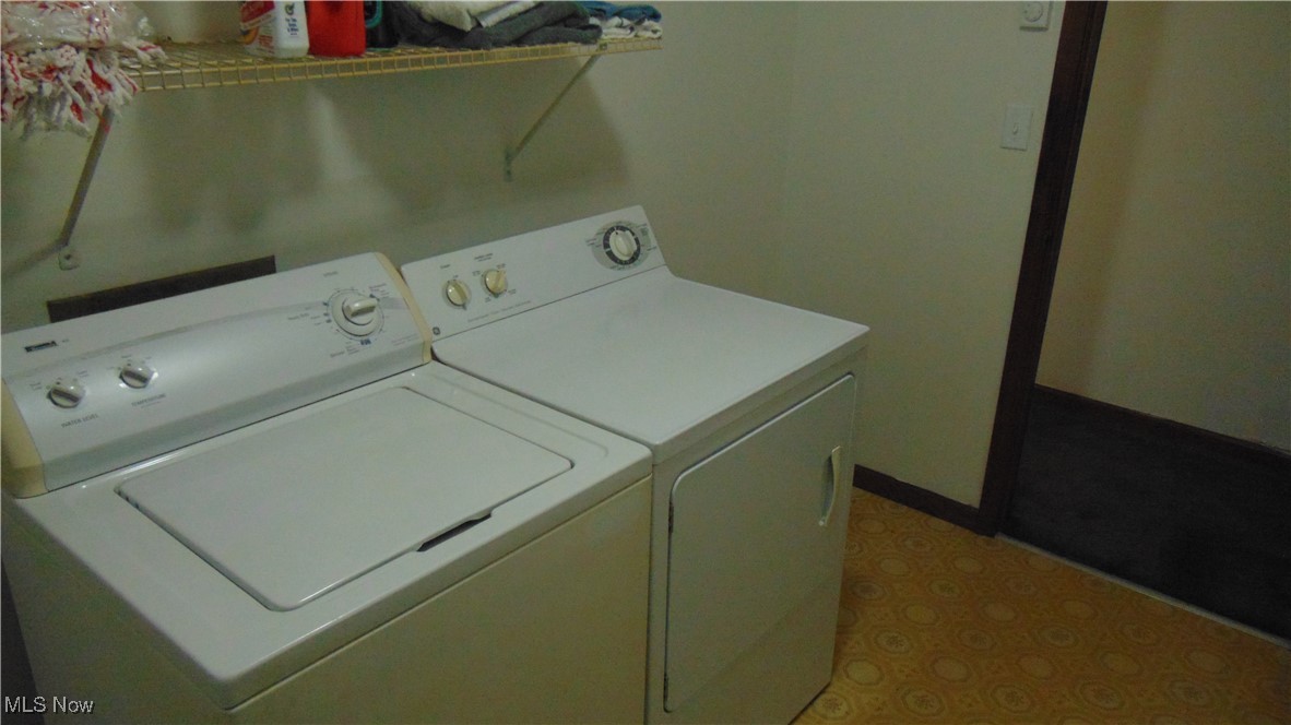 4970 Bryenton Road Litchfield, OH 44253 - Photo 22 of 33 Laundry room featuring washing machine and dryer