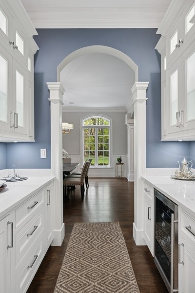 2 Bristol Road Northfield, IL 60093 - Photo 12 of 52 a open kitchen with granite countertop a stove a sink and a refrigerator