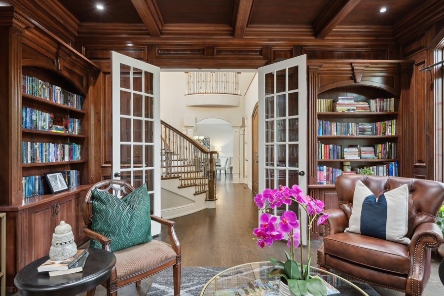2 Bristol Road Northfield, IL 60093 - Photo 16 of 52 a living room with furniture cabinets and book shelf