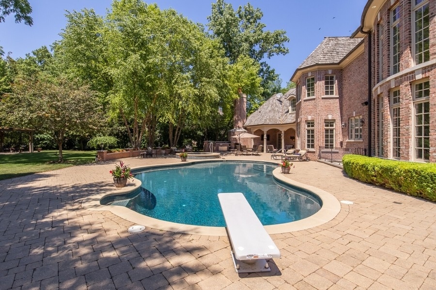 2 Bristol Road Northfield, IL 60093 - Photo 20 of 52 a view of a house with swimming pool