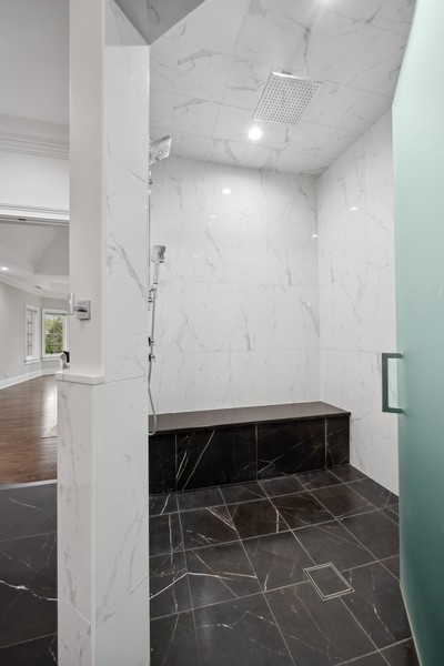 2 Bristol Road Northfield, IL 60093 - Photo 28 of 52 a room with a window and a shower