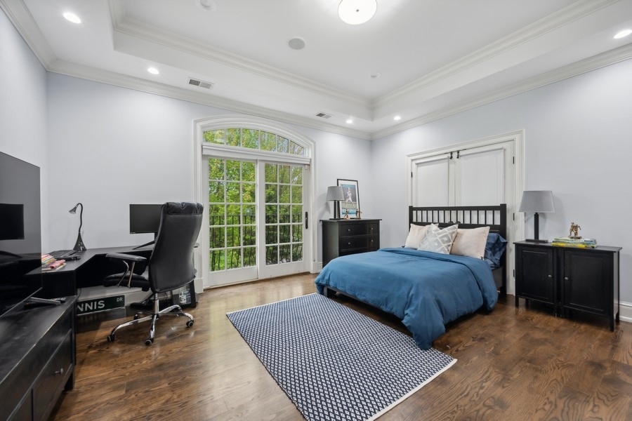 2 Bristol Road Northfield, IL 60093 - Photo 30 of 52 a bedroom with a bed and a desk