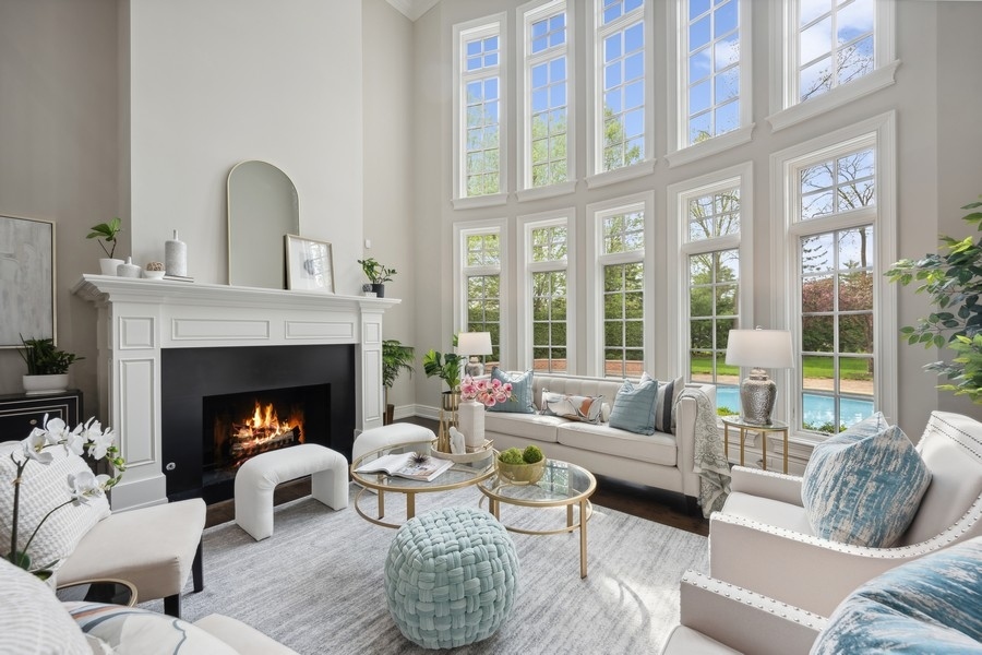 2 Bristol Road Northfield, IL 60093 - Photo 3 of 52 a living room with furniture fireplace and a large window