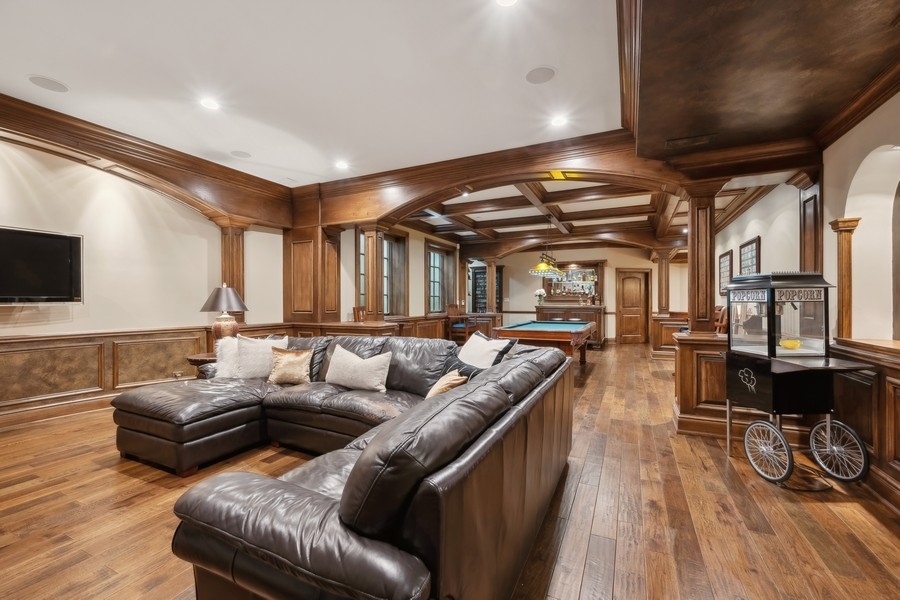 2 Bristol Road Northfield, IL 60093 - Photo 37 of 52 a living room with furniture and a flat screen tv
