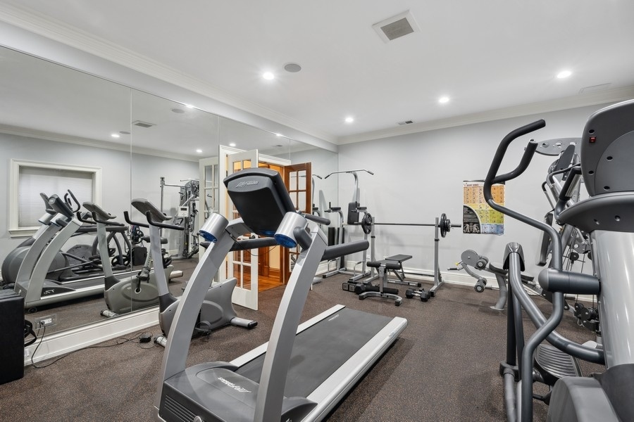 2 Bristol Road Northfield, IL 60093 - Photo 39 of 52 a view of a room with gym equipment