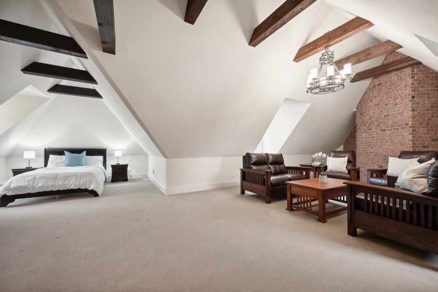 2 Bristol Road Northfield, IL 60093 - Photo 48 of 52 a living room with furniture and a lamp