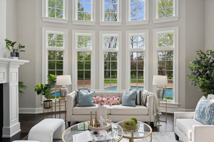 2 Bristol Road Northfield, IL 60093 - Photo 5 of 52 a living room with furniture fireplace and potted plants