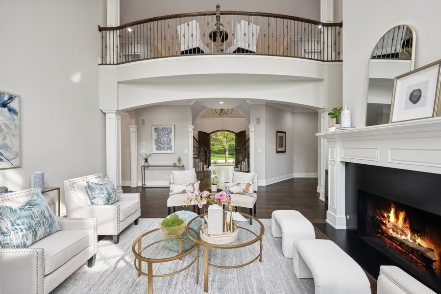 2 Bristol Road Northfield, IL 60093 - Photo 6 of 52 a living room with furniture and a fireplace