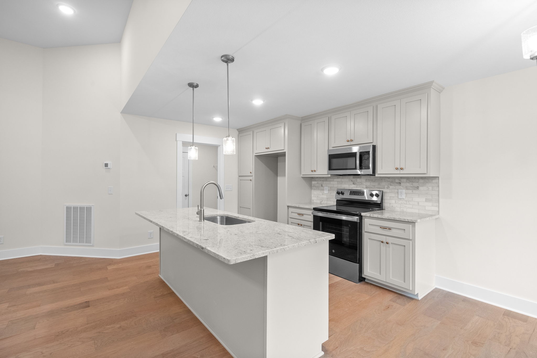 1928 Flats Road Cunningham, TN 37052 - Photo 14 of 49 a large kitchen with cabinets