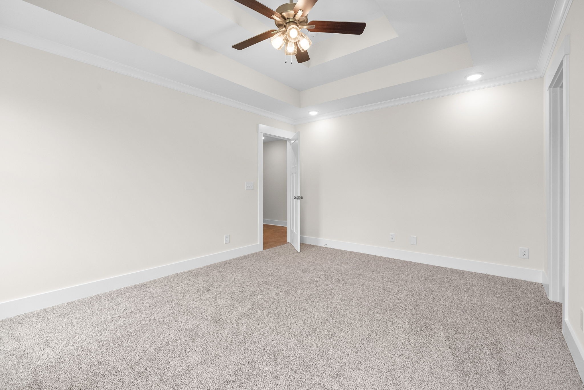 1928 Flats Road Cunningham, TN 37052 - Photo 24 of 49 an empty room with chandelier fan and ceiling fan