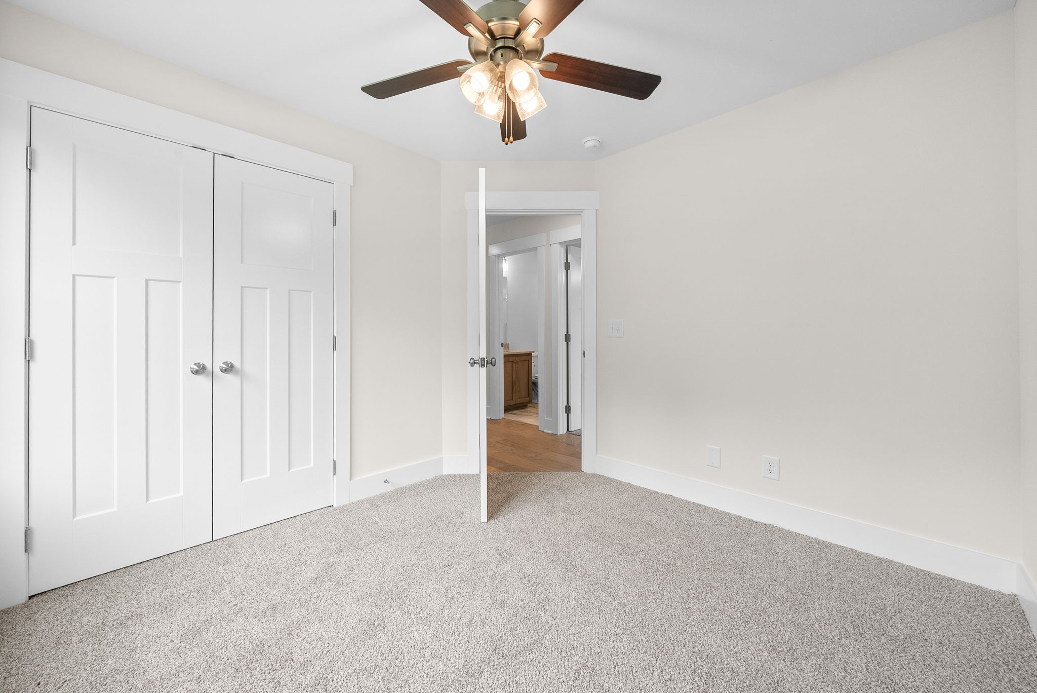 1928 Flats Road Cunningham, TN 37052 - Photo 36 of 49 a view of an empty room and chandelier fan
