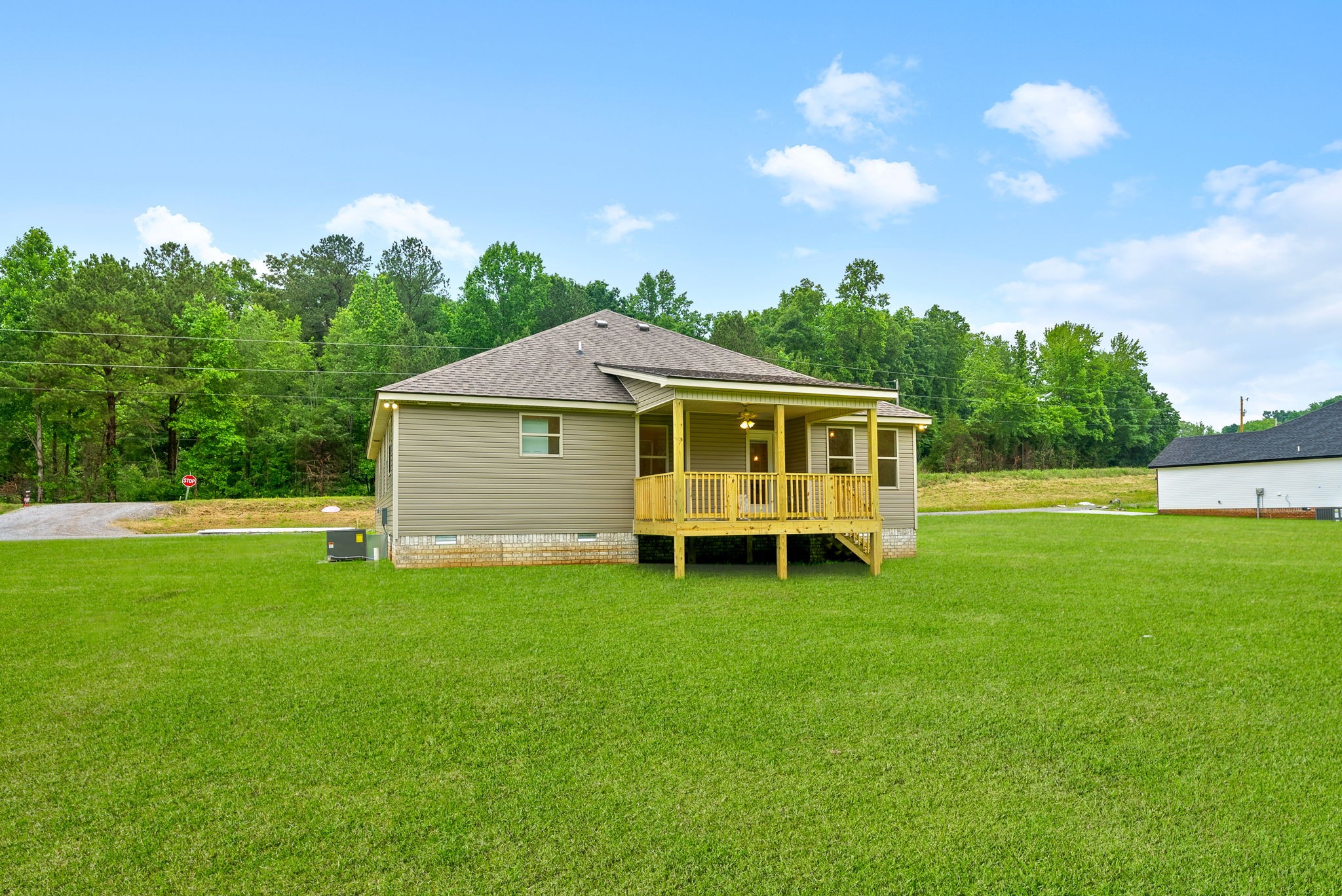 1928 Flats Road Cunningham, TN 37052 - Photo 41 of 49 a view of a house with a backyard