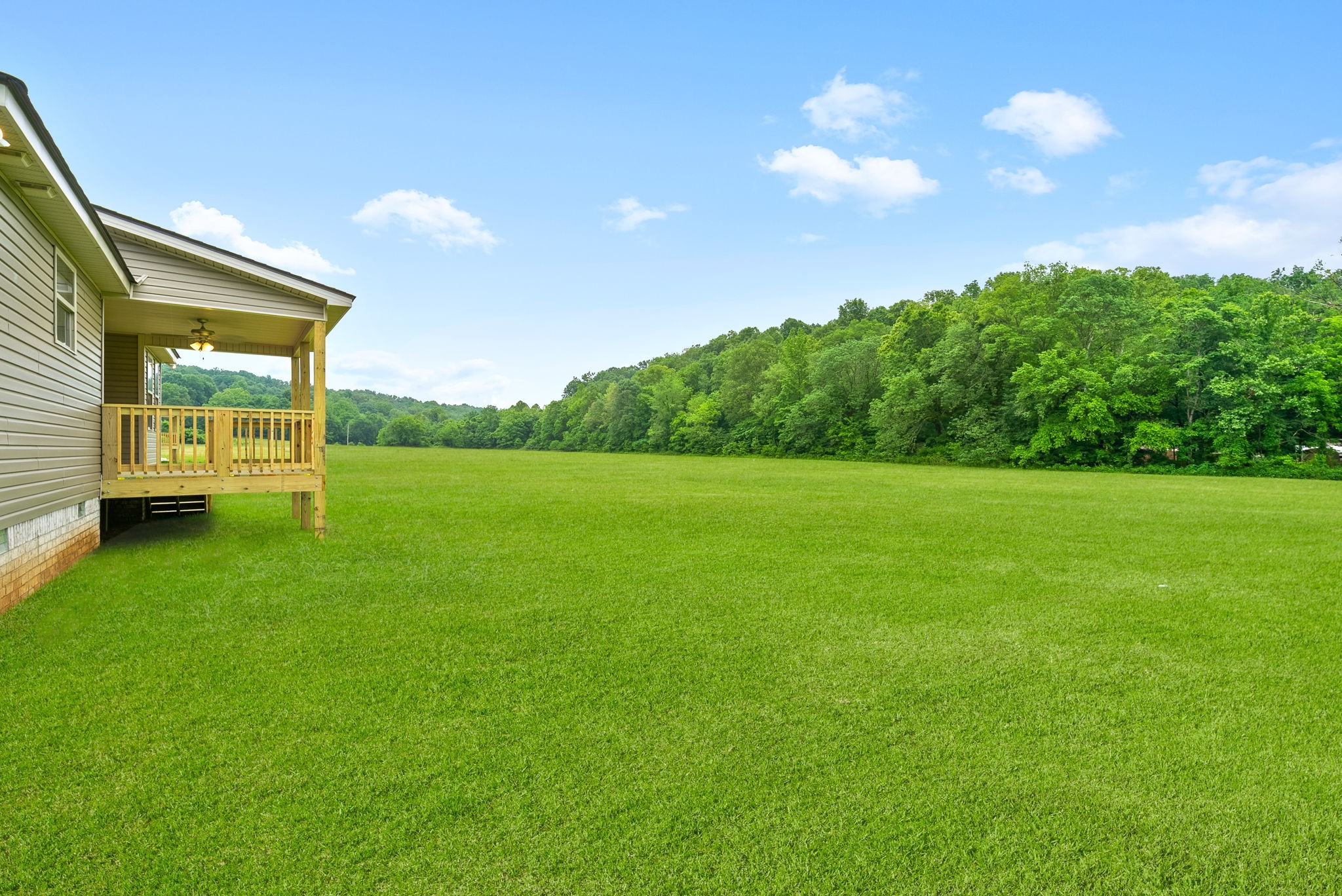 1928 Flats Road Cunningham, TN 37052 - Photo 42 of 49 a view of a green field