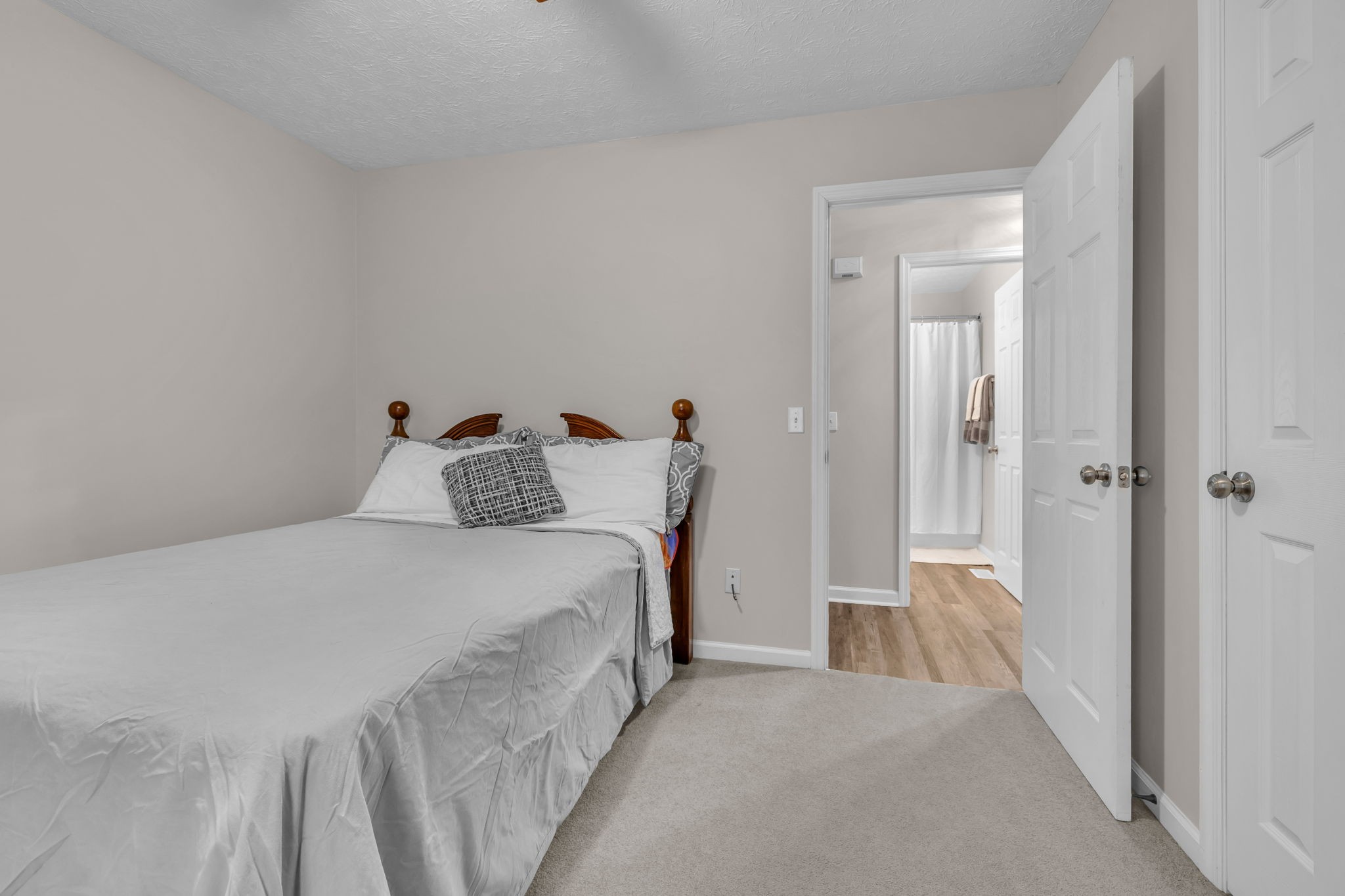 493 Goshen Road Lebanon, TN 37087 - Photo 20 of 29 a bedroom with a bed and a mirror